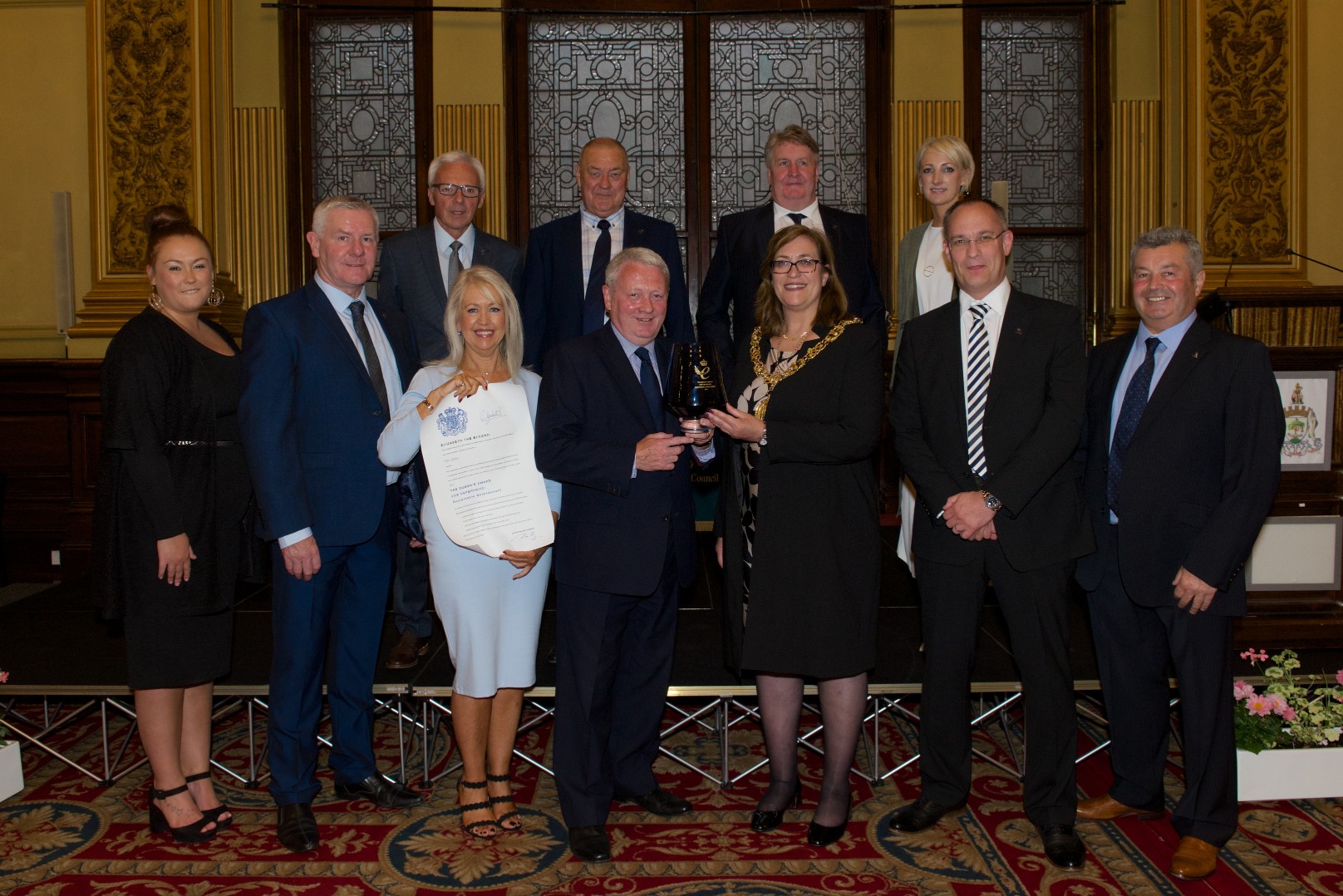 Image of The Lord Provost of Glasgow presenting the Queens Award to Cruden Staff, as part of the City Legacy Homes Consortium