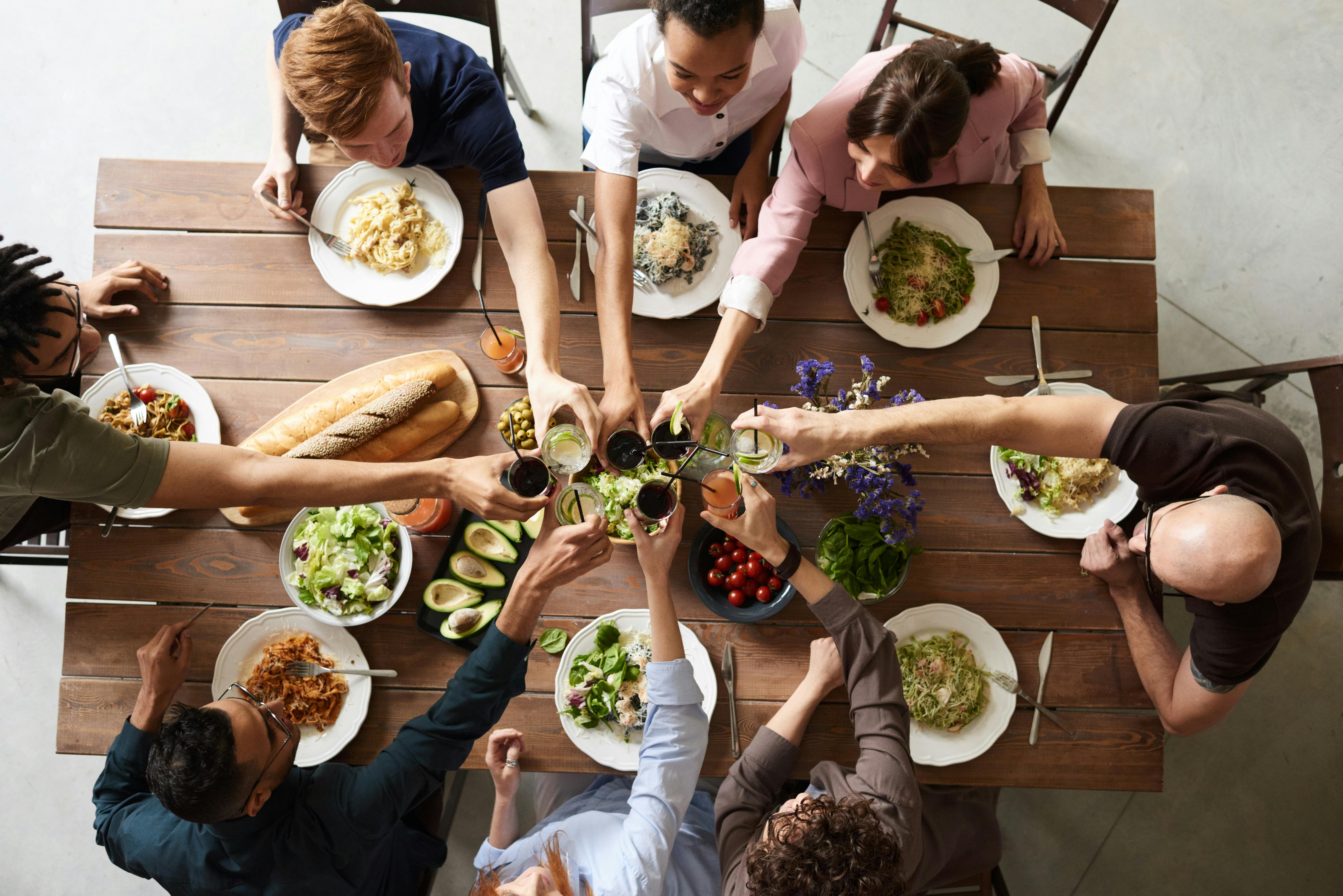 Group of people making a toast 